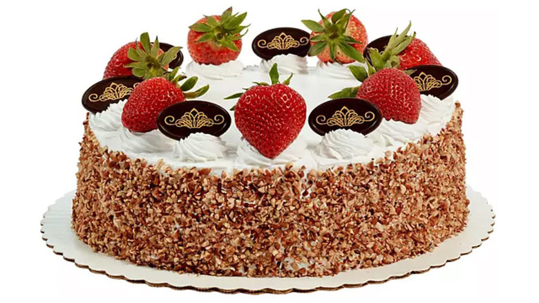 Cake with white frosting strawberries