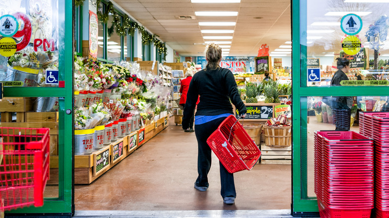 Shopper at Trader Joe's entrance 