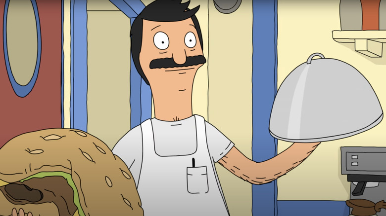 Bob smiling with burger