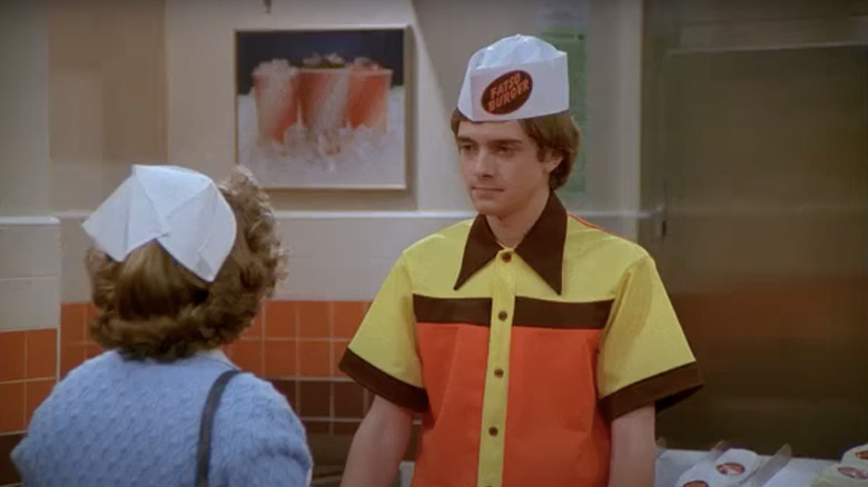 Eric Forman wearing burger hat