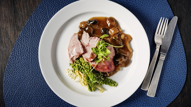 plate of pheasant and vegetables