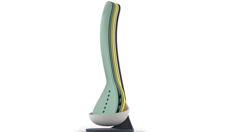 Magnetic nesting cooking utensils