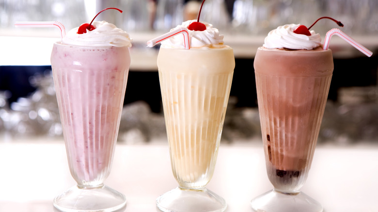 Strawberry, vanilla, and chocolate milkshakes