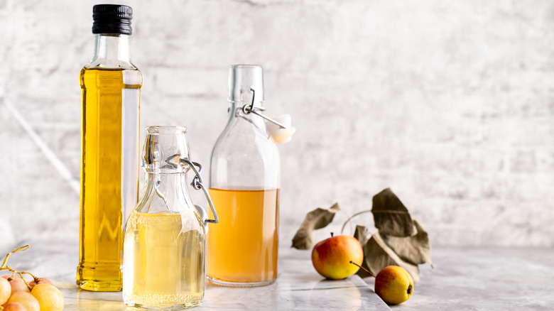 glass bottles of white vinegars