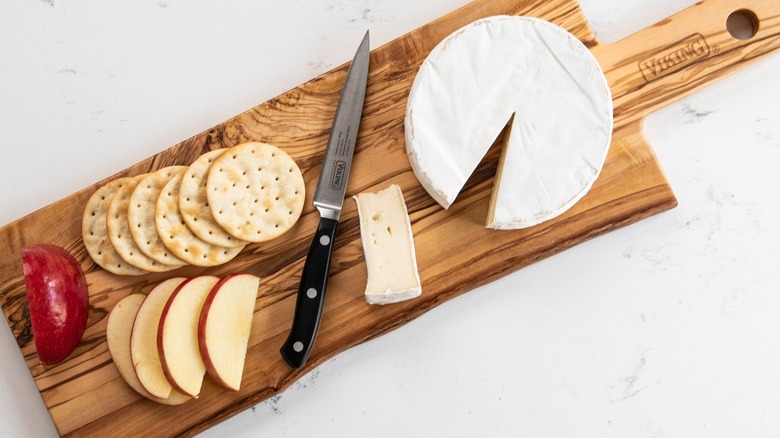 Wooden paddle cheese board