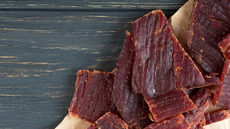 Beef jerky on wooden board