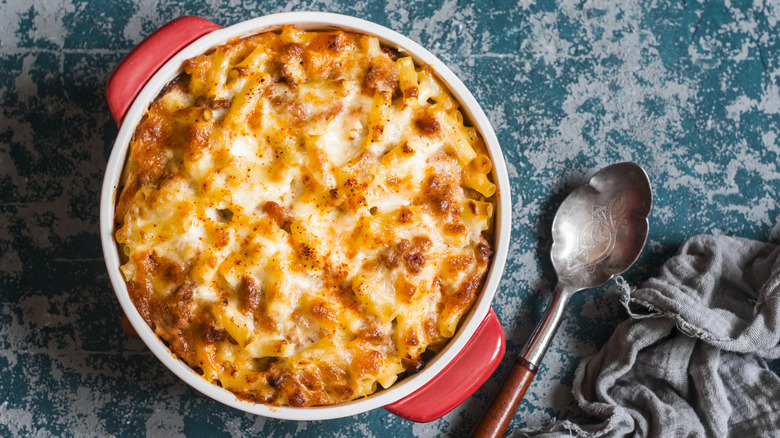 Mac and cheese in red bowl