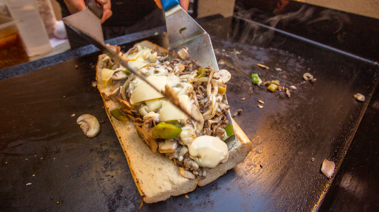 Philly cheesesteak on a cooktop