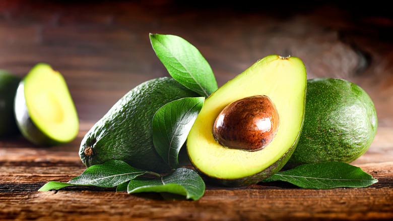 fresh cut avocado with pit