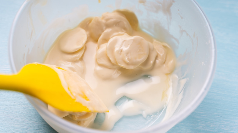Tempering white chocolate.