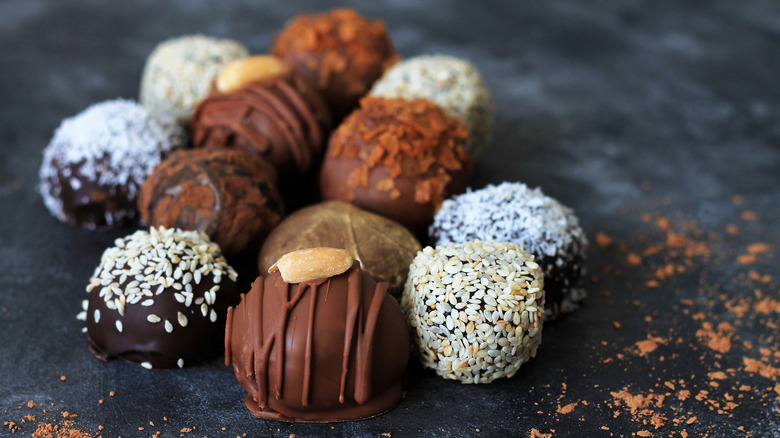 Gourmet chocolate truffles on slate