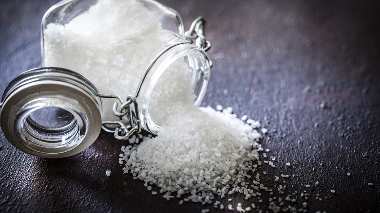 spilled glass salt container
