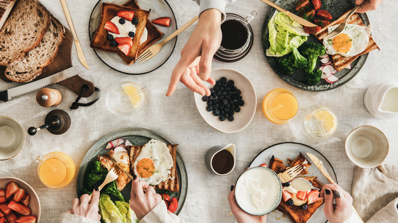 Breakfast and brunch foods spread on table