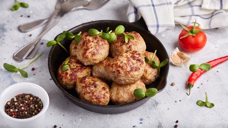 Ground pork meatballs in bowl