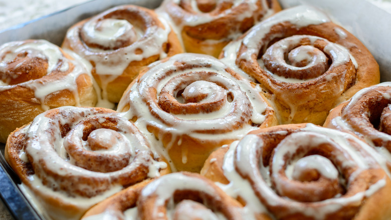 Tray of iced cinnamon rolls