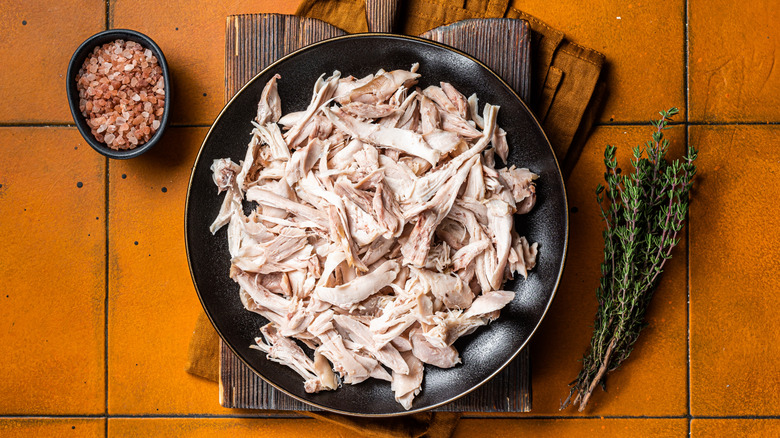 Shredded chicken in a pan