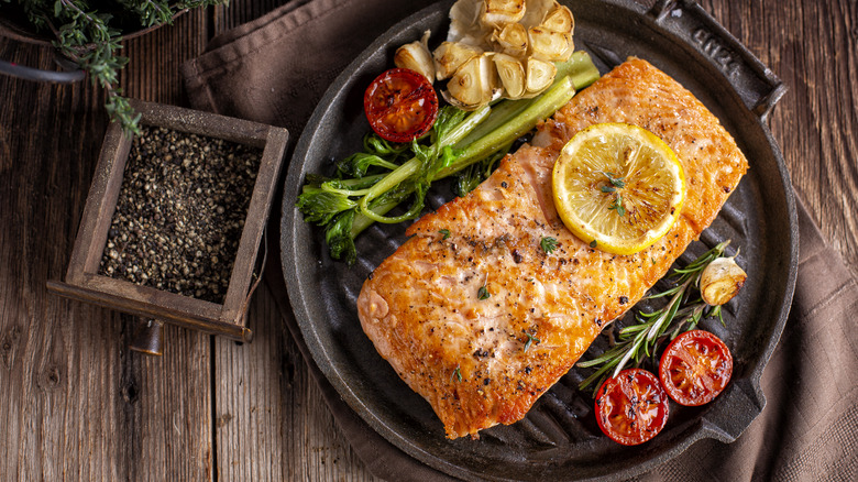 Cooked salmon fillet with vegetables