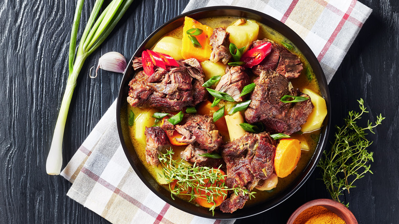 Goat curry with chilies and vegetables