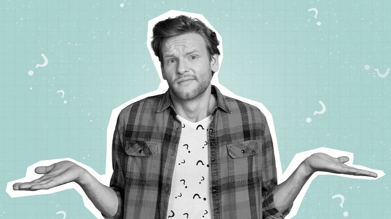 Man shrugging his arms in confusion
