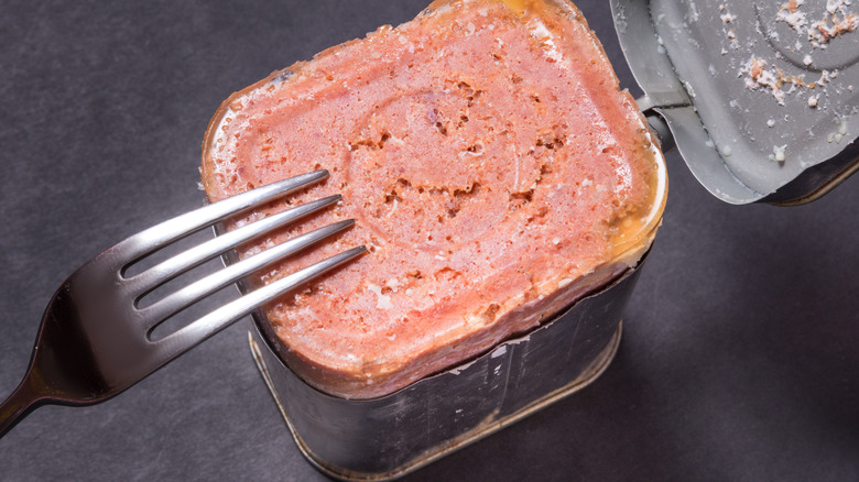Canned corned beef with fork