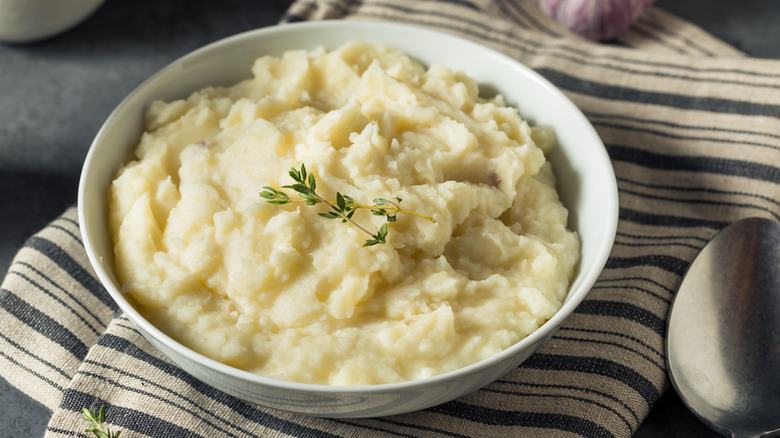 Mashed potatoes in white bowl
