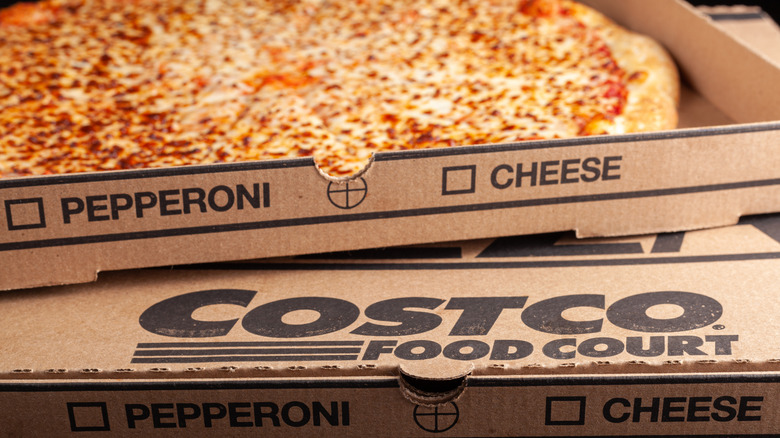 Opened box of Costco pizza