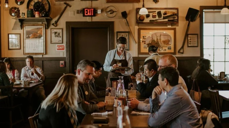 Cracker Barrel server taking orders