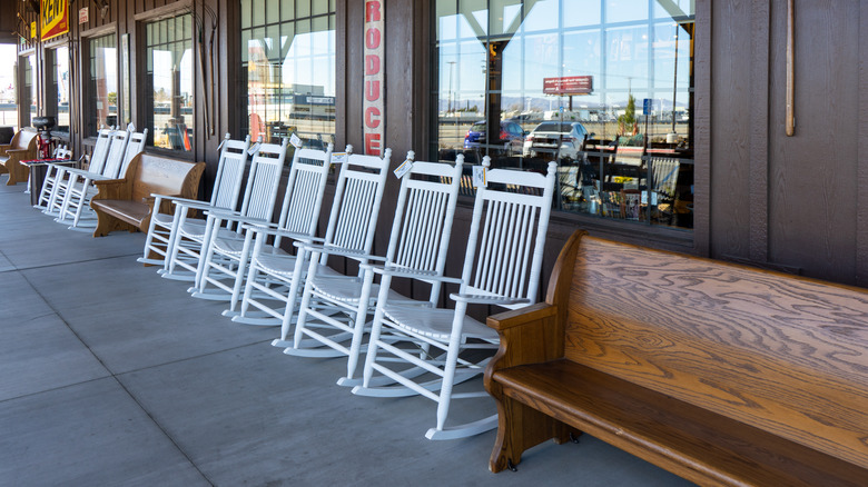 White rocking chairs outside Cracker Barrel