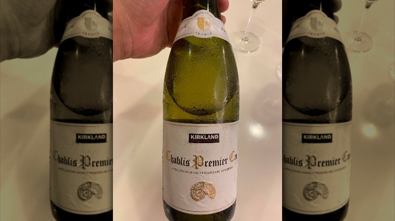 hand holding Chablis Premier Cru