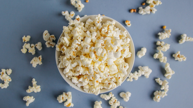 bowl of popcorn on dark grey background