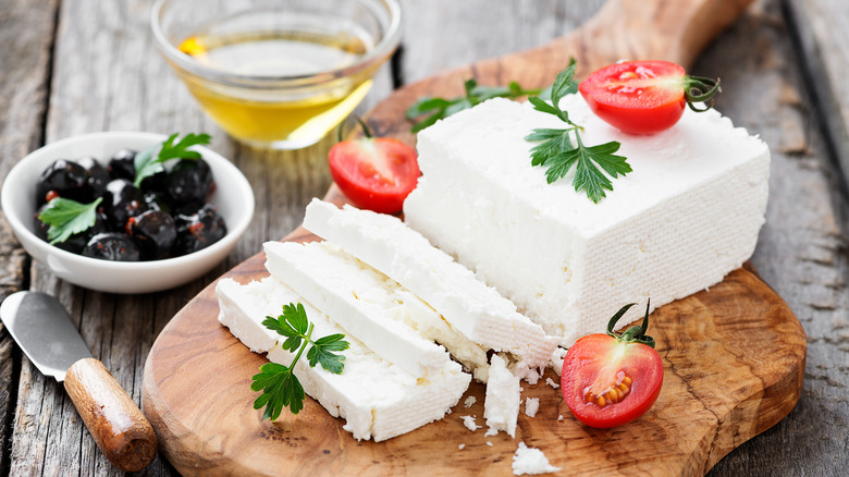 Feta cheese on wooden block