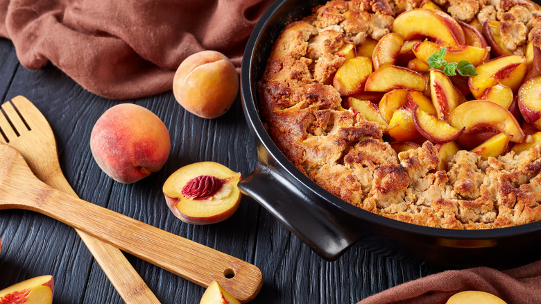 Peach cobbler in a cast iron skillet