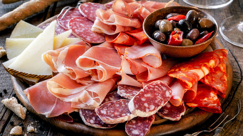 Charcuterie board, prosciutto, olives