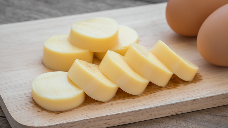 sliced egg tofu on board