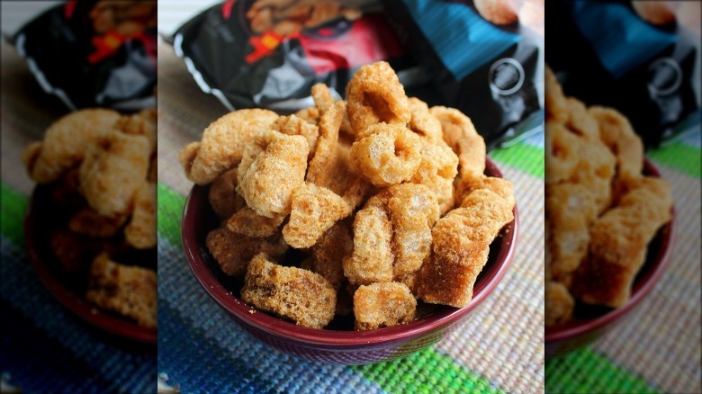 pork cracklins in red bowl