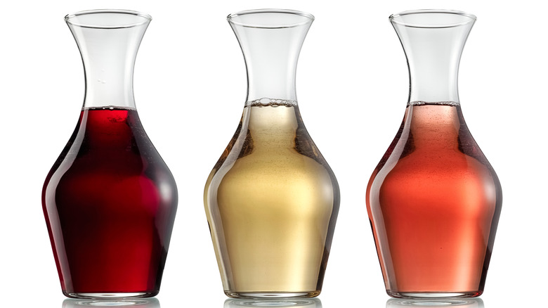 Three wines in decanters