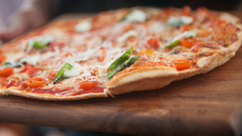 Close-up of thin-crust pizza