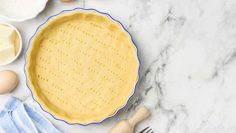 pastry dough inside a tart pan