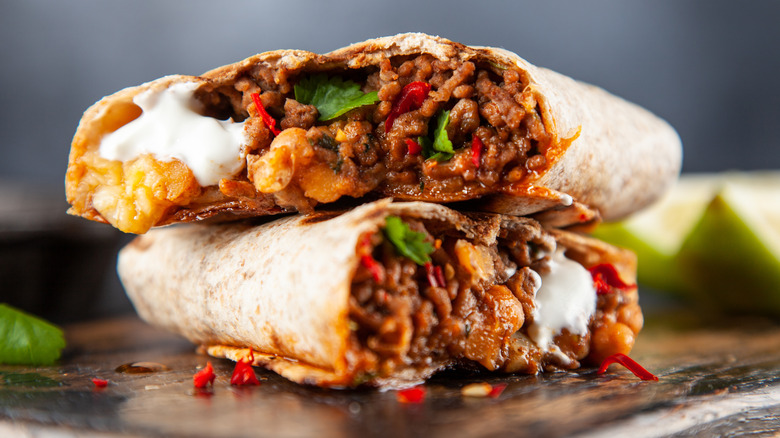 Burrito with cheese, meat, and sour cream