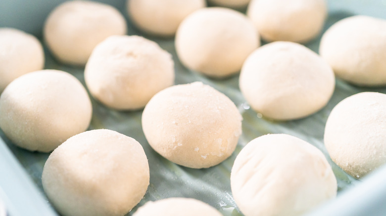 frozen dinner rolls on a pan