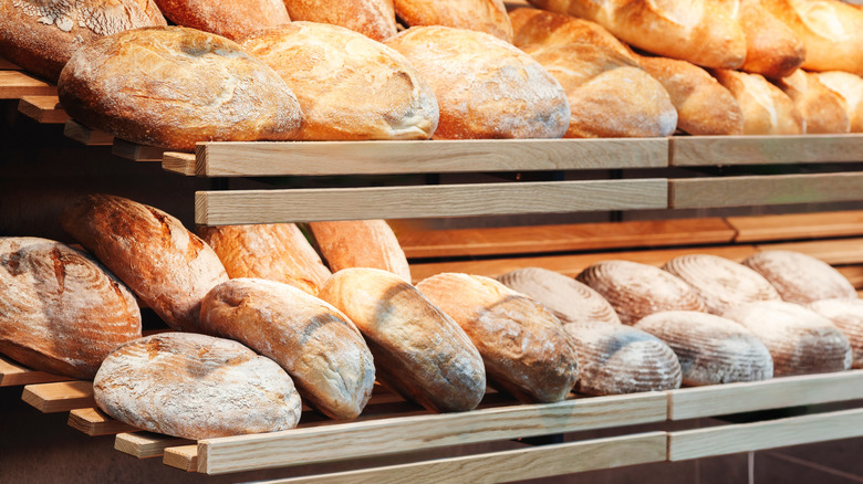 Different types of bread on shelf at store
