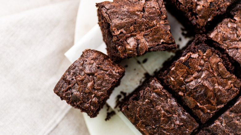Chocolate brownies on light background