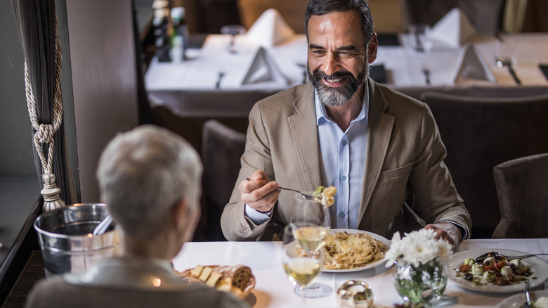 couple eating at a fancy restaurant