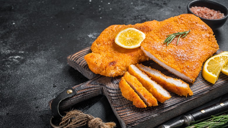chicken cutlets topped with lemon and rosemary