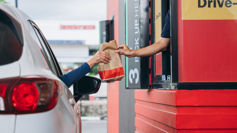 person at drive-thru window