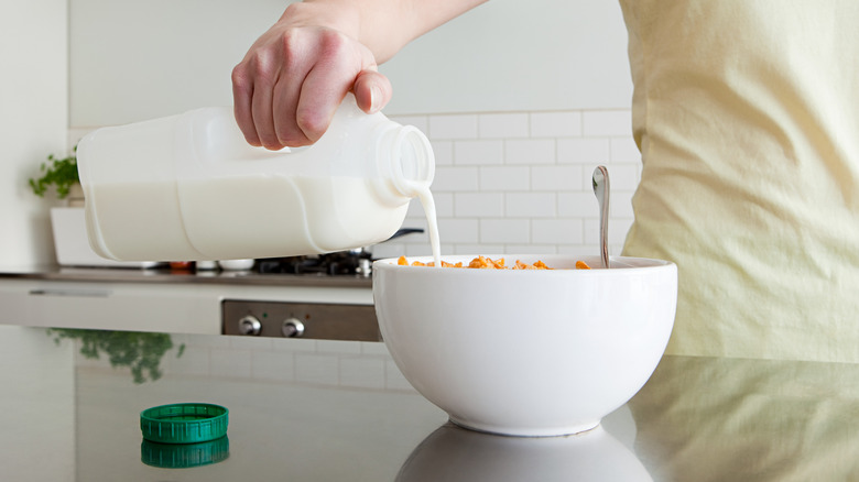 milk pouring into a bowl