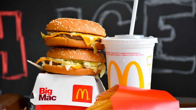 McDonald's burgers, fries, and a drink