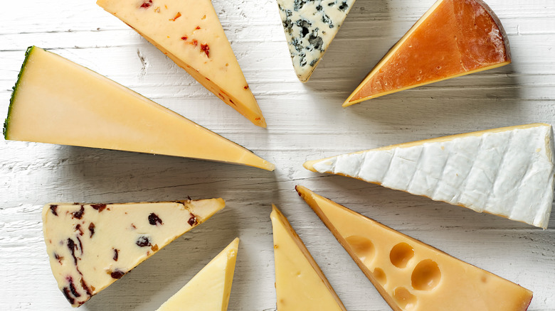 assorted wedges of cheese