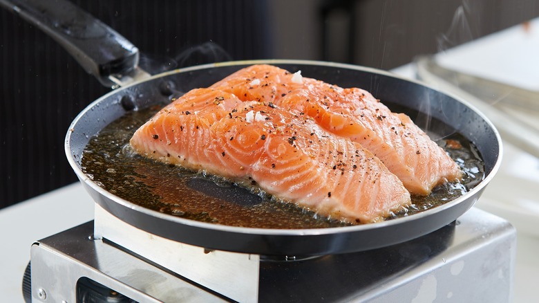 Pan-frying salmon steaks 