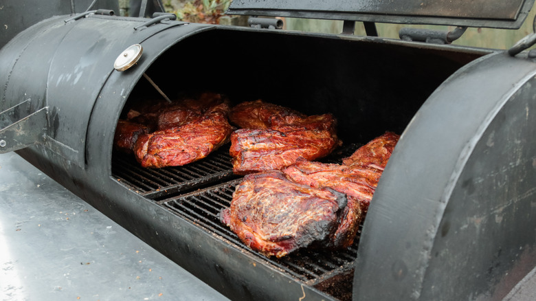 meat in a smoker